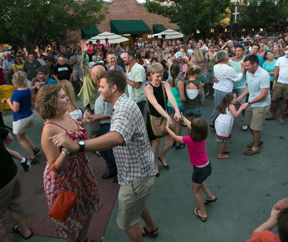 Hundreds of people join together on the Basque Block in Downtown Boise for a street dance celebrating the annual San Inazio Festival on Saturday, July 26, 2014.