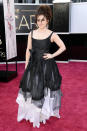 <b>Helena Bonham Carter</b><br> <b>Grade: C+</b><br> Helena Bonham Carter hit the 2013 Oscars sporting this gauzy black-and-white Vivienne Westwood creation and messy mane. Whether you love or hate her, um, eclectic sense of style, the "Les Miserables" actress seems to have a clear sense of what <i>she</i> likes ... and always sticks with it.