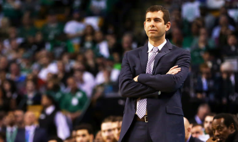 Brad Stevens crossing his arms.