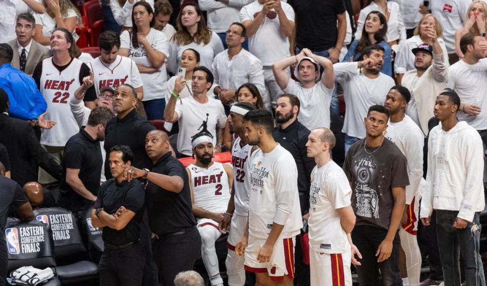 Miami Heat players react after losing against the Boston Celtics 104 to 103 in Game 6 of the NBA Eastern Conference Finals at the Kaseya Center on Saturday, May 27, 2023, in downtown Miami, Fla.
