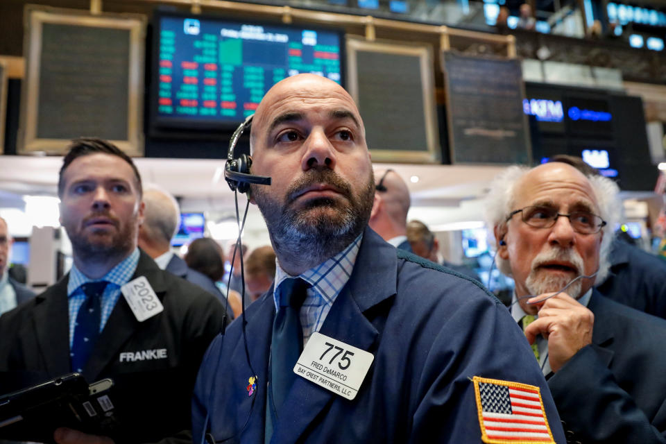 Traders work on the floor of the New York Stock Exchange (NYSE) in New York, U.S., September 21, 2018. REUTERS/Brendan McDermid