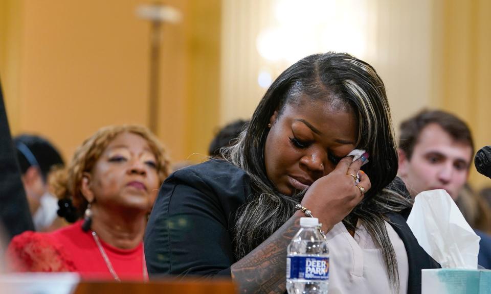 Wandrea "Shaye" Moss, a former Georgia election worker, becomes emotional as she testifies before the committee to investigate the January 6 attack on the United States Capitol on June 21, 2022. Left is Ruby Freeman, Moss' mother.