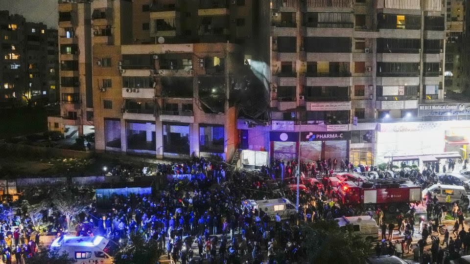 People search for survivors following a massive explosion in a southern suburb of Beirut, Lebanon, on Jan. 2, 2024. - Hassan Ammar/AP