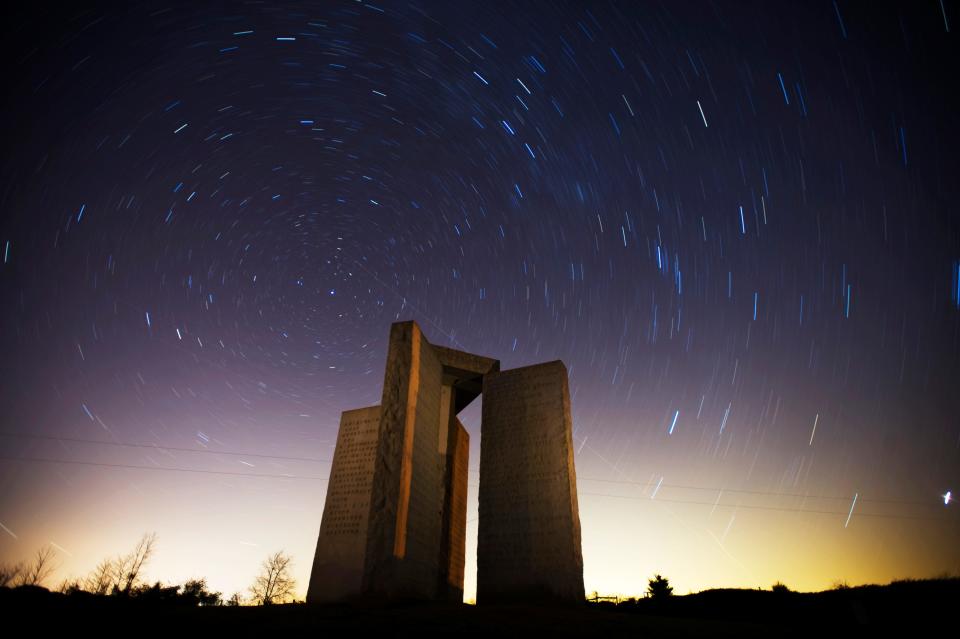 The North Celestial Pole swirls above the Georgia Guidestones in Elberton on Dec. 1, 2010. The granite monument often referred to as the &quot;American Stonehenge&quot; have ten guiding principles engraved on them in eight different languages.