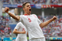 <p>Poland’s Jan Bednarek celebrates scoring the only goal of the game as Poland beat Japan </p>