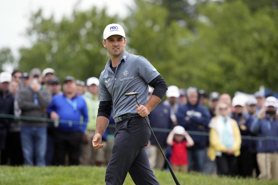 Denny McCarthy watches his putt on the seventh hole during the final round of the U.S. Open golf tournament at The Country Club, Sunday, June 19, 2022, in Brookline, Mass. (AP Photo/Charlie Riedel)