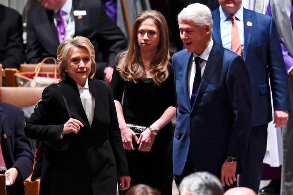 Hillary, Chelsea and Bill Clinton