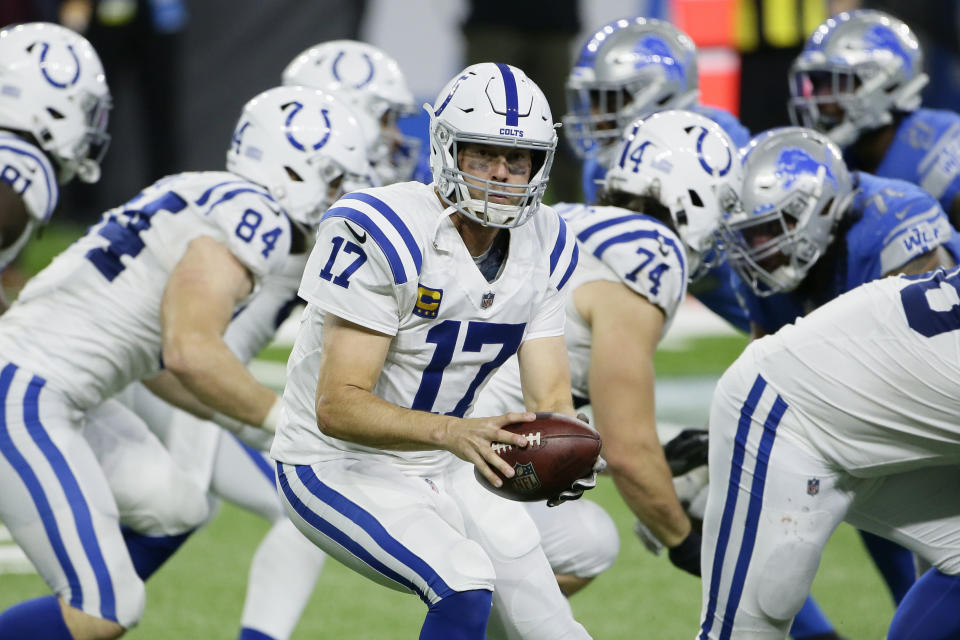 Indianapolis Colts quarterback Philip Rivers prepares to hand off during the second half of an NFL football game against the Detroit Lions, Sunday, Nov. 1, 2020, in Detroit. (AP Photo/Duane Burleson)