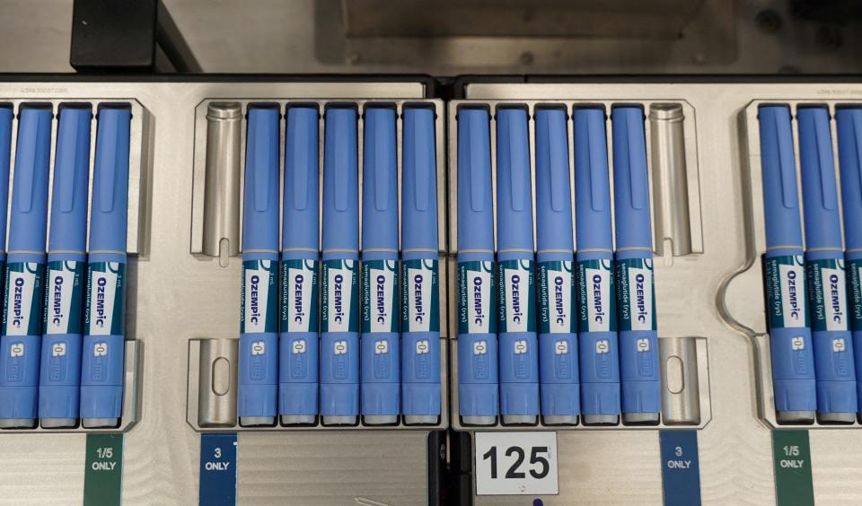 Pens for the diabetes drug Ozempic sit on a production line at Danish drugmaker Novo Nordisk's site in Hillerod, Denmark, Sept. 26, 2023.