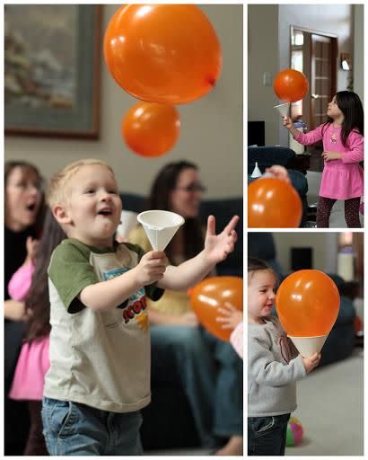 <p>For little ones, blow up orange balloons — bonus points if you draw a jack o' lantern face on them with black marker — and give each kid a funnel. See who can catch their balloon in the funnel the most times. (Adults, you might have fun trying this one, too.) </p><p><a href="http://www.vanillajoy.com/last-minute-halloween-party-idea-balloon-catch.html" rel="nofollow noopener" target="_blank" data-ylk="slk:See the tutorial at Vanilla Joy »;elm:context_link;itc:0;sec:content-canvas" class="link "><em>See the tutorial at Vanilla Joy »</em></a></p>