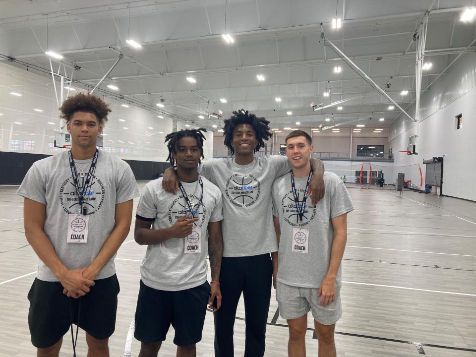 Sophomore Dan Skillings Jr. with new University of Cincinnati teammates freshman Jizzle James, freshman Rayvon Griffith and grad student C.J. Fredrick at Pro Camps July 18 leading clinics at Spooky Nook Champion Mill in Hamilton.