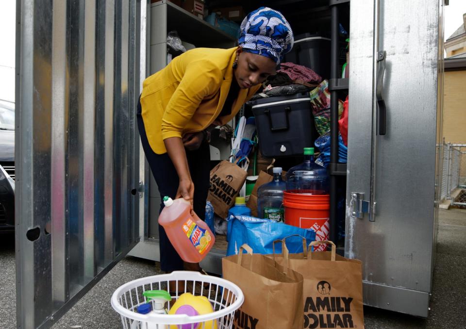 A recent U.S. Department of Justice audit determined that the Providence-based Refugee Dream Center needs to do a better job of tracking how it spends federal funds. Executive Director Teddi Jallow is seen in this file photo making up baskets of supplies for clients.