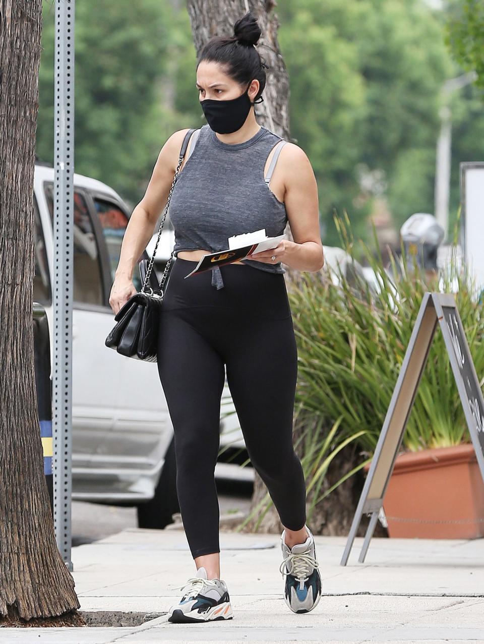 <p>New mom Nikki Bella is seen out in L.A. on Thursday running errands in black leggings and sneakers.</p>