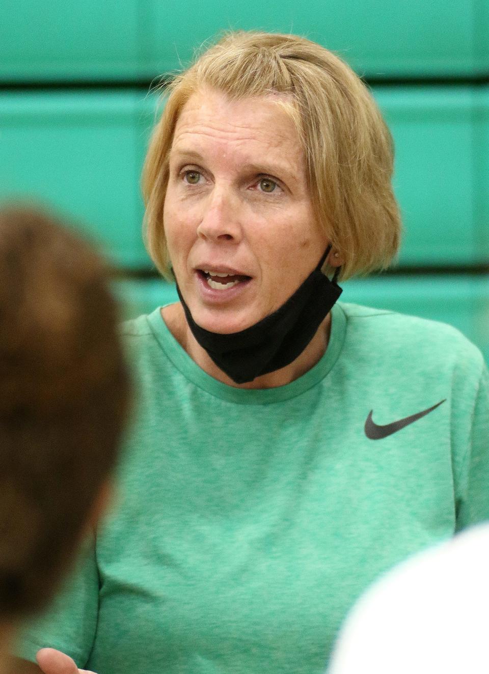 West Branch volleyball coach Penny DeShields talks to the team following their match against Massillon on Thursday, September 30, 2021.