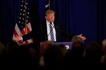 U.S. Republican presidential candidate Donald Trump speaks to voters at a rally at the Turtle Point Golf Club in Kiawah Island, South Carolina, February 18, 2016. REUTERS/Randall Hill