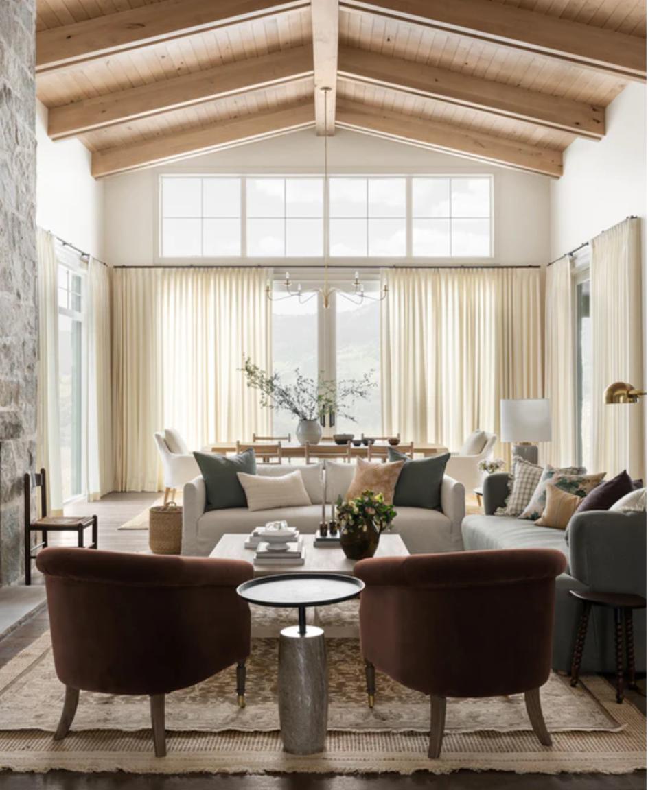 Living room with layered rugs