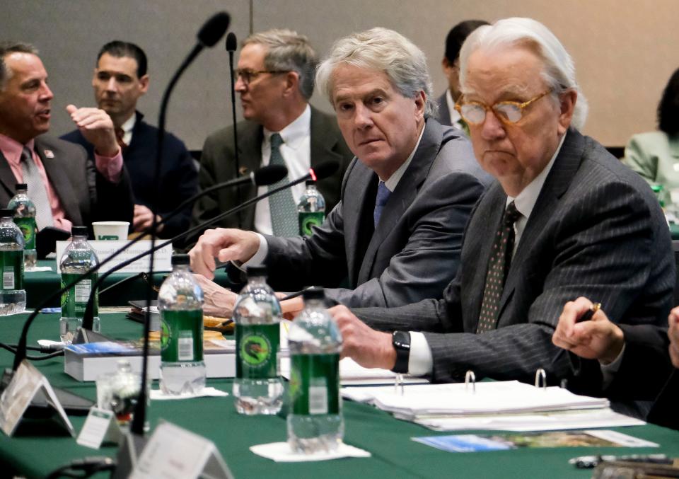 University of Alabama System Chancellor Finis St. John IV, left, sits next to board of trustees President Pro Tempore W. Stancil Starnes at a Feb. 3, 2023, meeting.