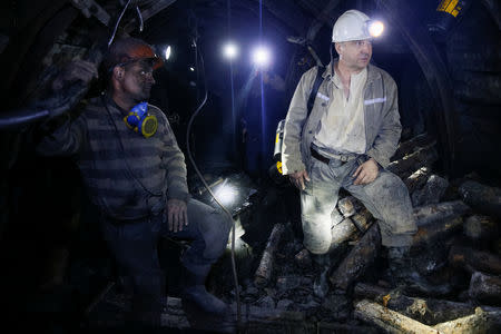 Director of the Novovolynska-9 coal mine Volodymyr Yurkiv speaks to miners underground in the mine in Novovolynsk, Ukraine August 2, 2018. Picture taken August 2, 2018. REUTERS/Valentyn Ogirenko