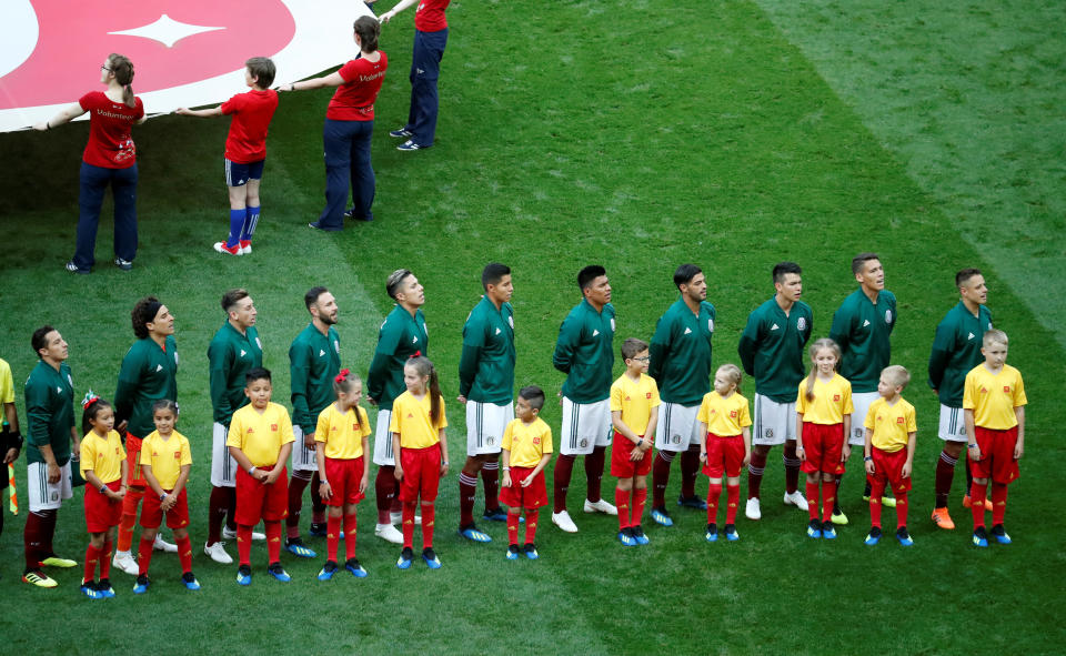 Team Mexico players line up before the match.