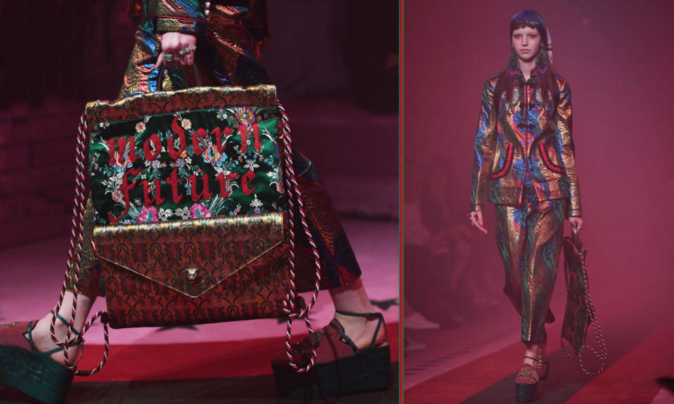 A brocade and embroidered backpack paired with platforms and a brocade Gucci suit on the runway at Milan Fashion Week. Photos: Getty Images
