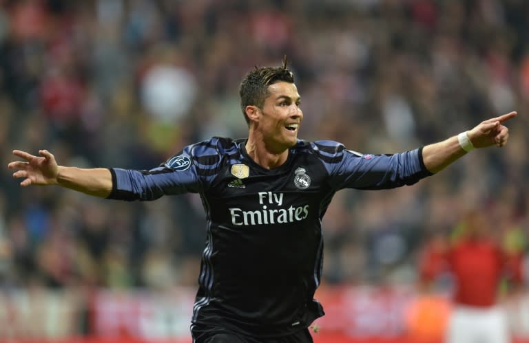 Real Madrid's forward Cristiano Ronaldo reacts after scoring during the UEFA Champions League 1st leg quarter-final football match against Bayern Munich April 12, 2017