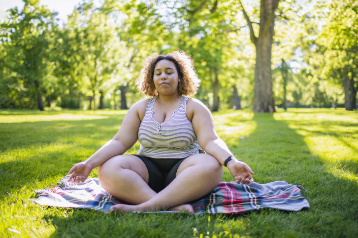 Meditation is a free and easy way to improve brain function. (Getty Images)