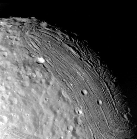 The surface of Uranus' moon Miranda (seen here) is pocked with craters, but humans might be able to find a way to settle it. The image was taken during Voyager 2's flyby of the Uranus system in 1986.