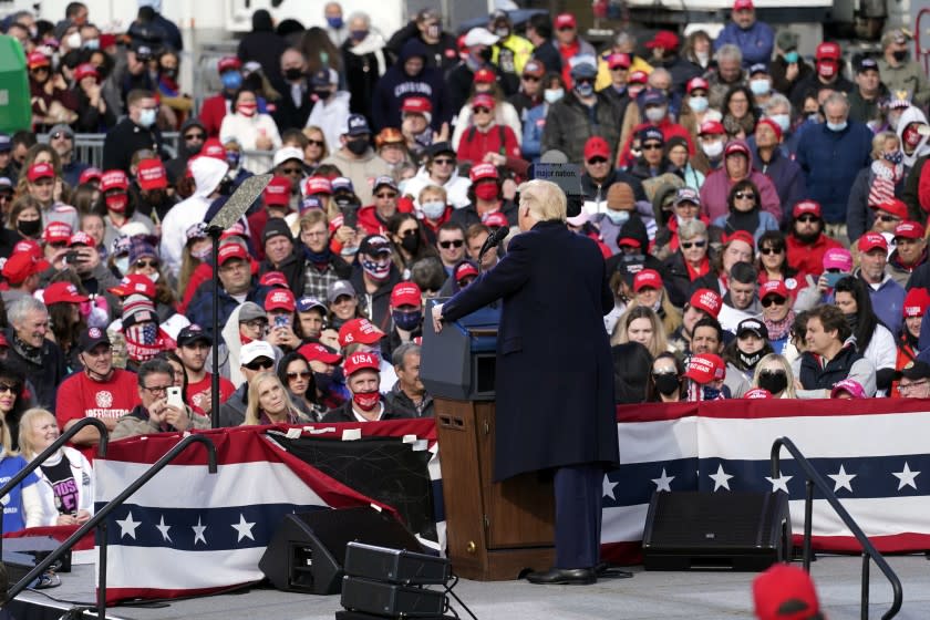 President Donald Trump speaks at a campaign rally at Manchester-Boston Regional Airport, Sunday, Oct. 25, 2020, in Londonderry, N.H. (AP Photo/Alex Brandon)