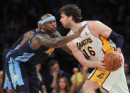 LOS ANGELES, CA - APRIL 29: Pau Gasol #16 of the Los Angeles Lakers is defended by Al Harrington #7 of the Denver Nuggets during the second half in Game One of the Western Conference Quarterfinals in the 2012 NBA Playoffs on April 29, 2012 at Staples Center in Los Angeles, California. The Lakers defeated the Nuggets 103-88. NOTE TO USER: User expressly acknowledges and agrees that, by downloading and or using this photograph, User is consenting to the terms and conditions of the Getty Images License Agreement. (Photo by Jeff Gross/Getty Images)