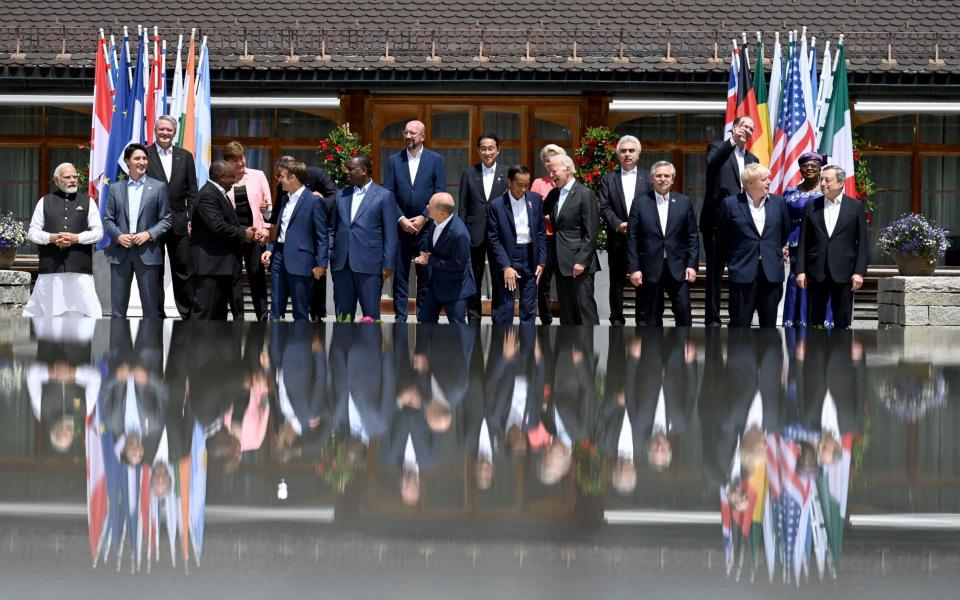 G7 leaders pose for the traditional G7 family photograph in Bavaria, Germany today - Tobias Schwarz/AFP