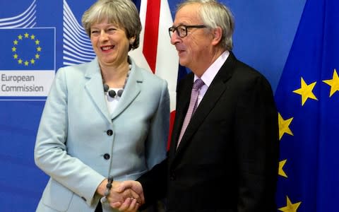 Theresa May and Jean-Claude Juncker - Credit: Virginia Mayo/AP