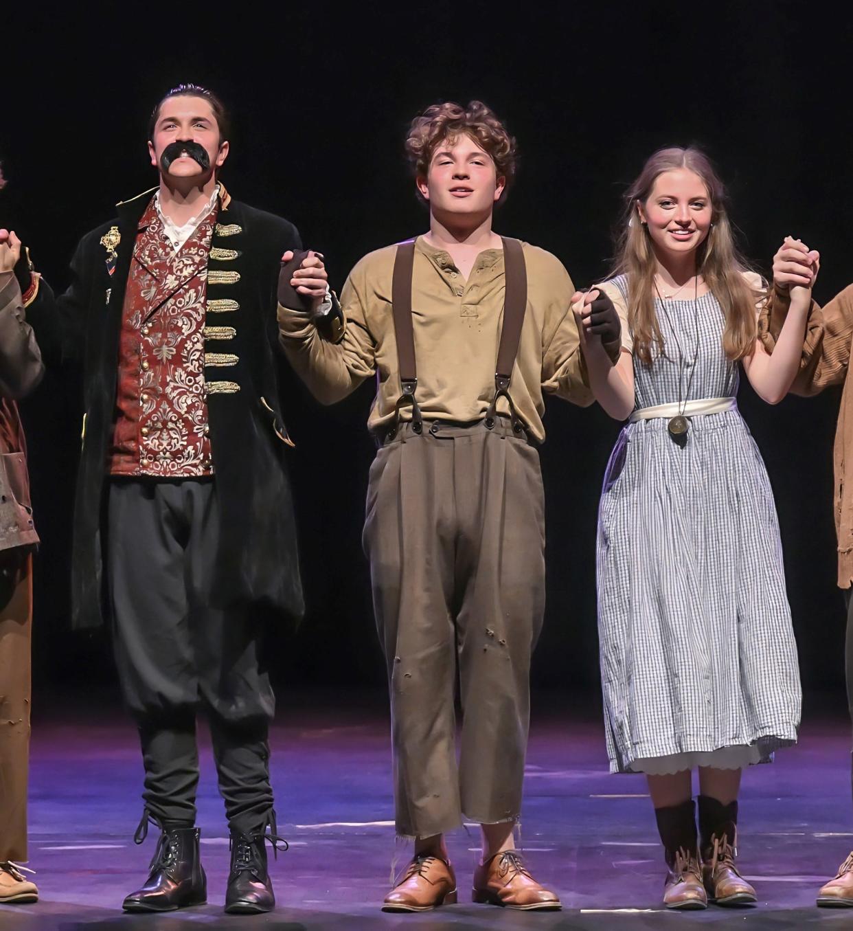 Savannah Country Day School students, Mollie Macfayden, Daniel Bosch (center) and Ben Templeton take a bow during a fall performance of 'Peter and the Starcatcher.' The entire program won 2023 GHSA regional and state competitions and the three of them earned individual awards, as well.