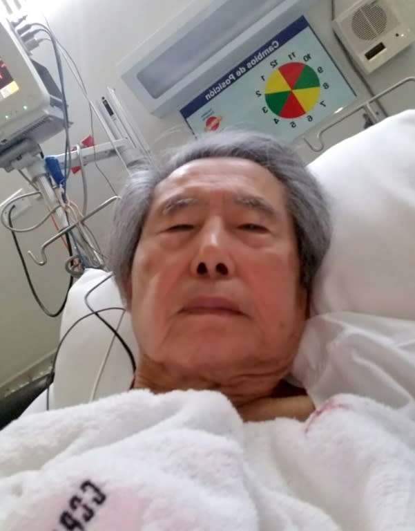 Handout photo released by the Fujimori family shows Peru's former president Alberto Fujimori in a hospital bed at the Centenario Clinic in Lima, on October 13, 2018