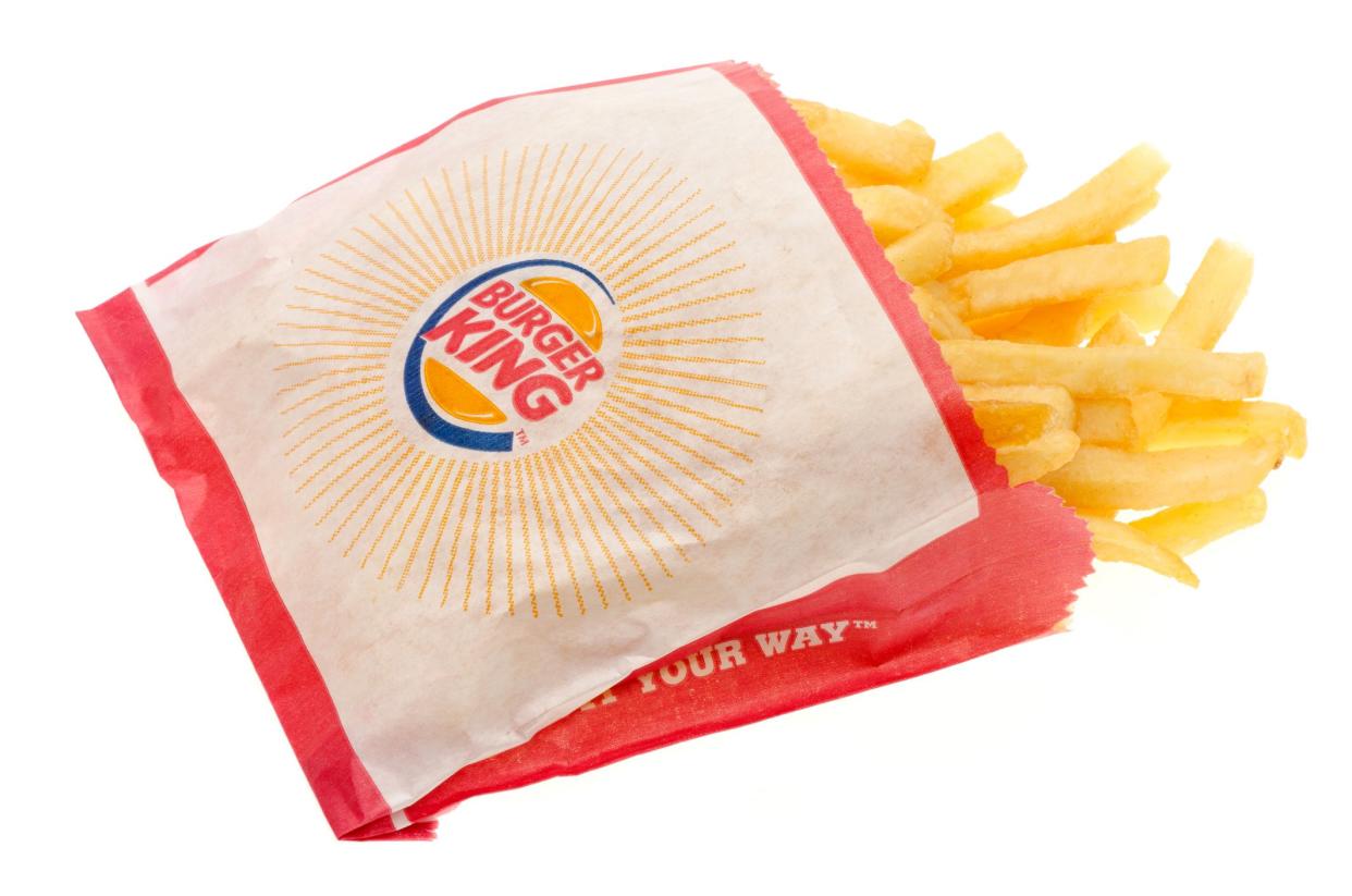 London, United Kingdom - July 26, 2011: Large size bag of Burger King fries, shot in the studio with a white background.