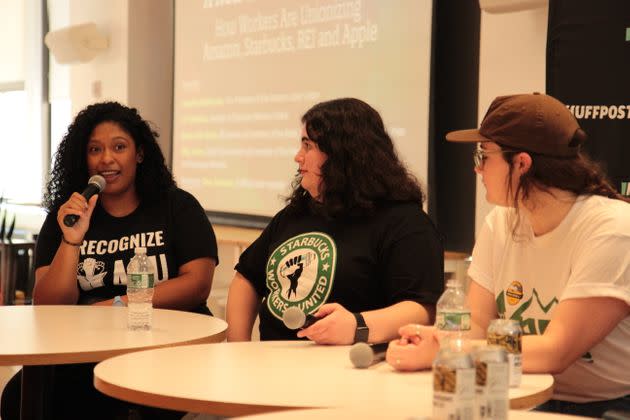 From left to right: Amazon worker Angelika Maldonado, Starbucks worker CJ Toothman and REI worker Emma Kate Harris speaking at 