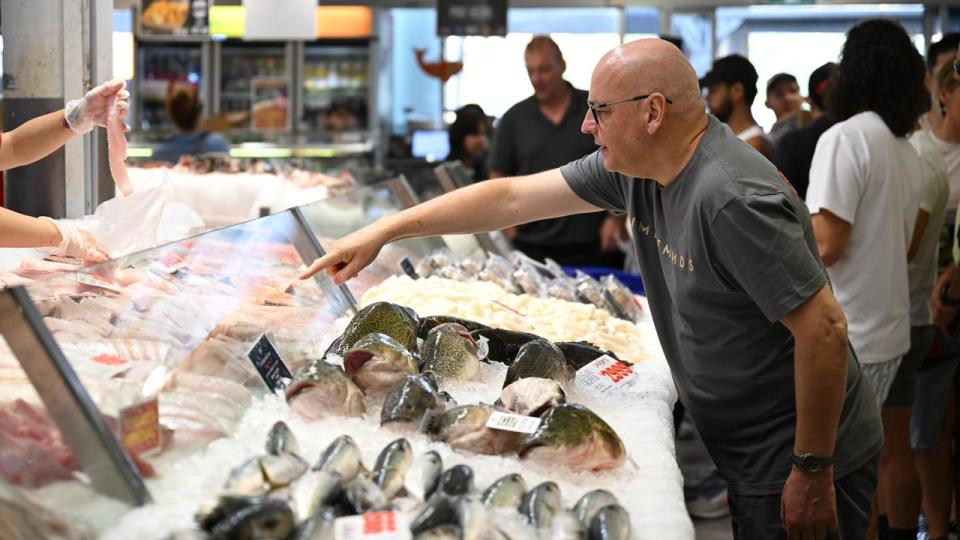 A man buying fish.