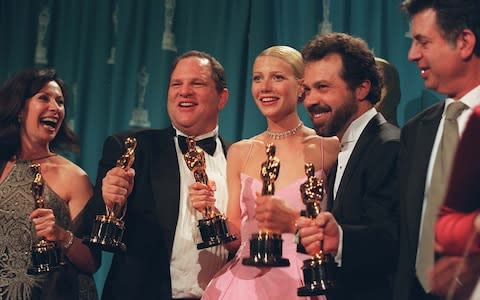 Harvey Weinstein with Gwyneth Paltrow at the 1999 Oscars celebrating the success of Shakespeare in Love - Credit: The New York Times