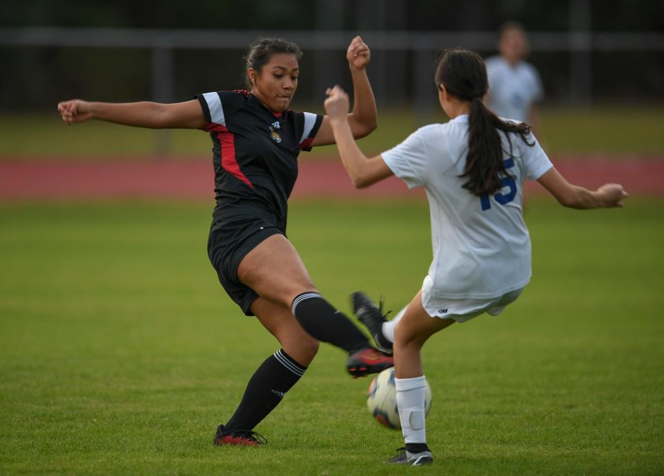 Sheyla Ramirez (left) of Port St. Lucie, and Alejandra Rocha, of Sebastian River fight for control during the first half of their girls soccer match on Thursday, Jan. 19, 2023, at Port St. Lucie High School. Port St. Lucie won 3-0.
