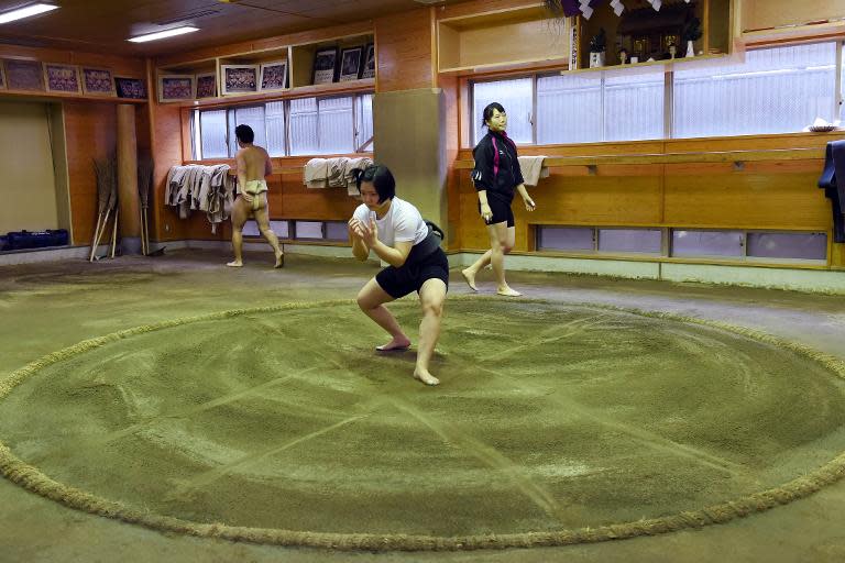Sayaka Matsuo (C) attends a training session in Tokyo for sumo wrestling, with moves to open up the sport to women part of efforts to legitimise it as a possible future Olympic event