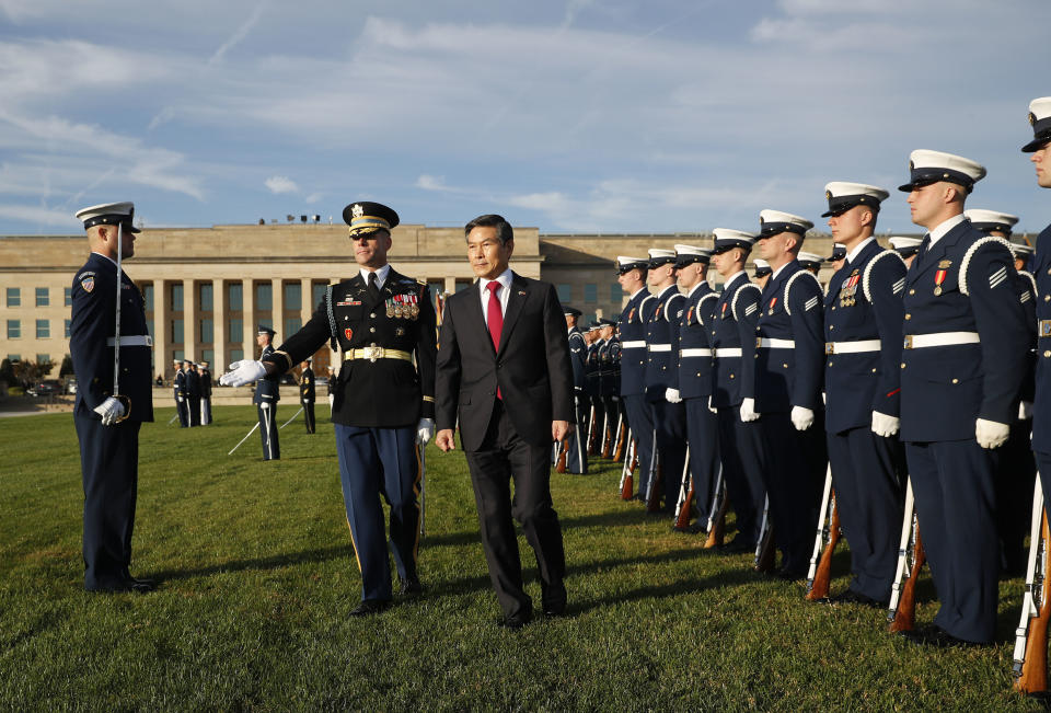 South Korea Minister of Defense Jeong Kyeong-doo, center, reviewing the troops as he co-host the 2018 Security Consultative with Defense Secretary Jim Mattis at the Pentagon, Wednesday, Oct. 31, 2018. (AP Photo/Pablo Martinez Monsivais)