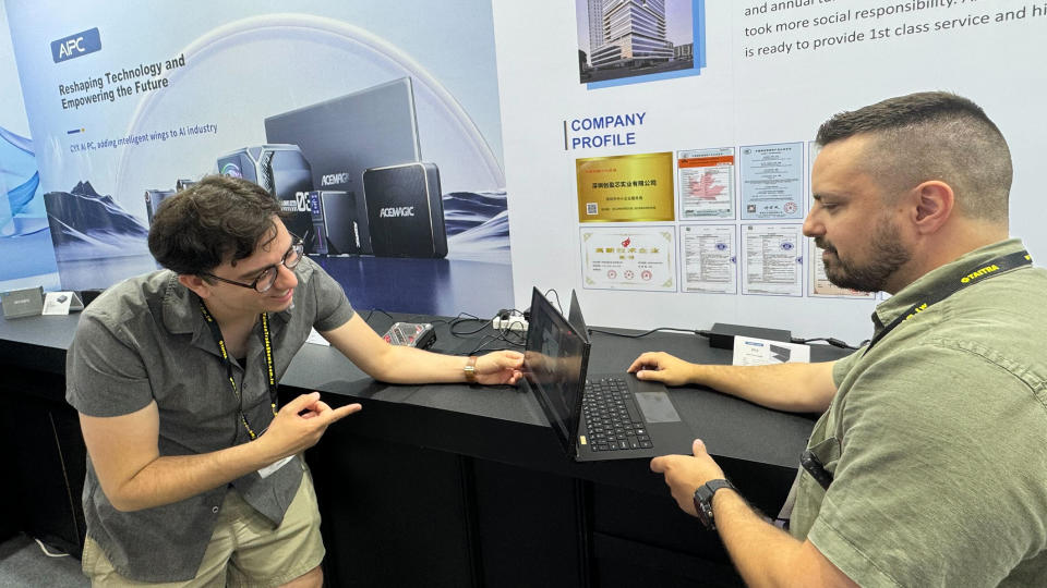 Acemagic V1 being used at Computex 2024.