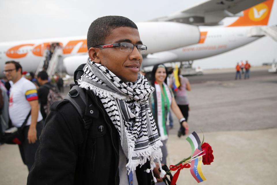 Palestinian students arrive at Simon Bolivar airport outside Caracas