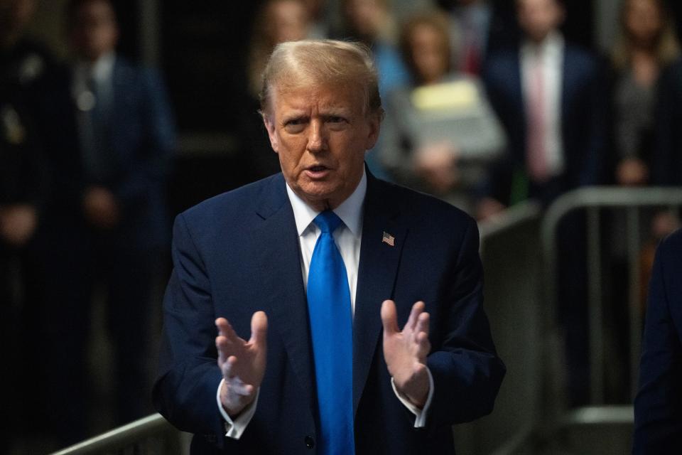 Former President Donald Trump speaks to the media at the end of the day at Manhattan Criminal Court during his trial for allegedly covering up hush money payments on April 22, 2024 in New York City. Trump was charged with 34 counts of falsifying business records last year, which prosecutors say was an effort to hide a potential sex scandal, both before and after the 2016 presidential election.