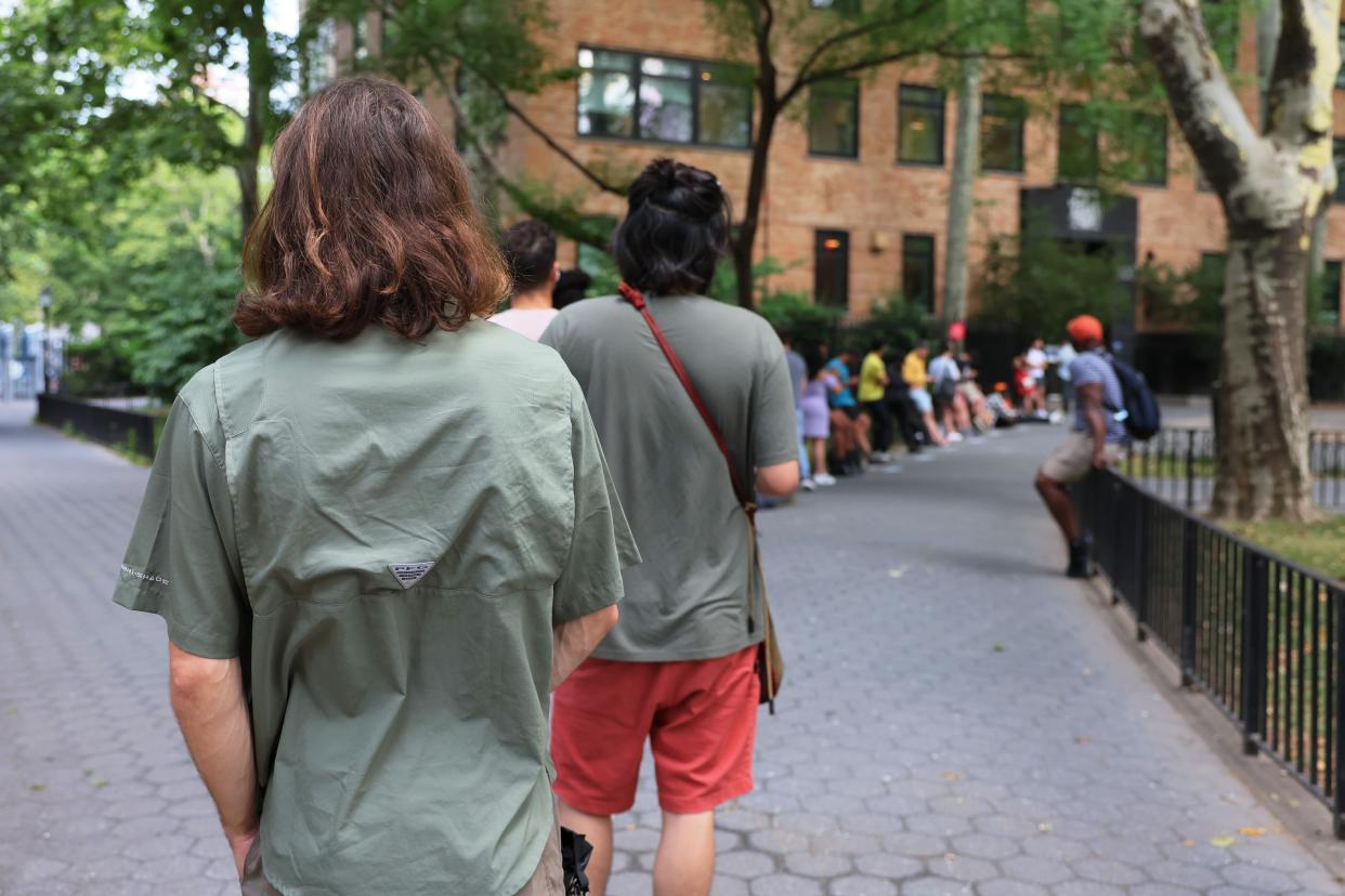 People wait in line to enter the Chelsea Sexual Health Clinic in Manhattan, New York on July 08, 2022. The clinic is one of two locations currently administering a vaccine for monkeypox in NYC. 