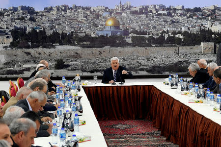 Palestinian President Mahmoud Abbas gestures as he speaks during a meeting with the Palestinian leadership in Ramallah, in the occupied West Bank March 19, 2018. Palestinian President Office (PPO)/Handout via REUTERS