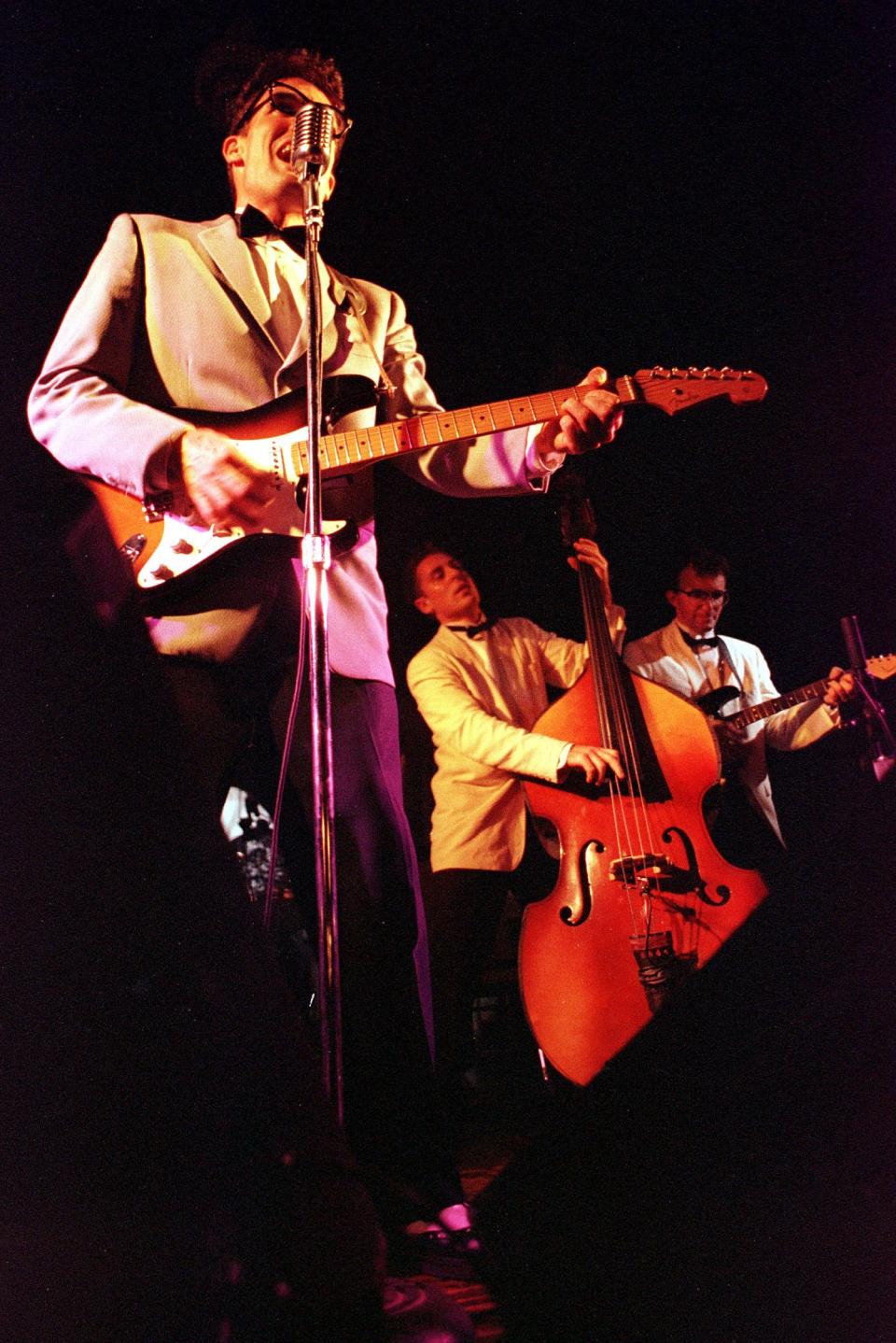 John Mueller leads the Winter Dance Party Band through one of many Buddy Holly songs at the Riverside Ballroom in Green Bay during one of his previous visits. He returns Friday night.