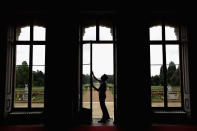 English Heritage employee Michael Murray-Fennell opens the doors that lead to the gardens of the 18th Century mansion at Wrest Park.