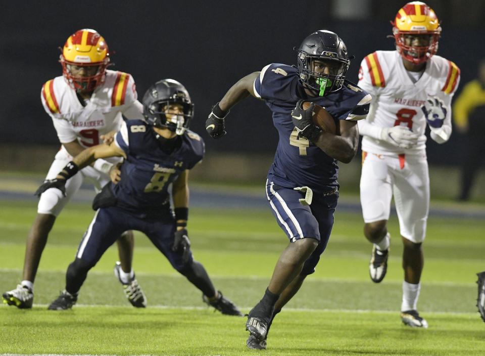 University Christian's Orel Gray (4) sprints to the end zone for a fourth-quarter touchdown against Clearwater Central Catholic in 2022.