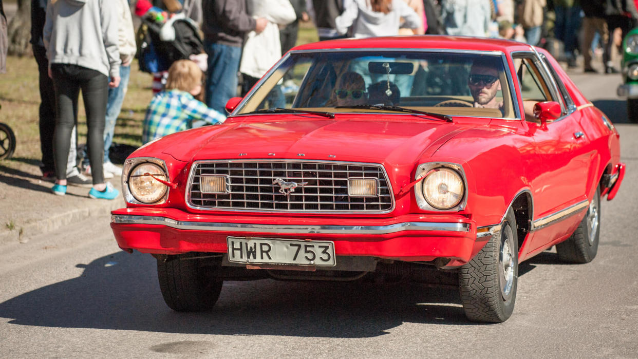 NORRKOPING, SWEDEN - MAY 1: Ford Mustang II Ghia 1975 at classic car parade celebrates spring on May 1, 2013 in Norrkoping, Sweden.