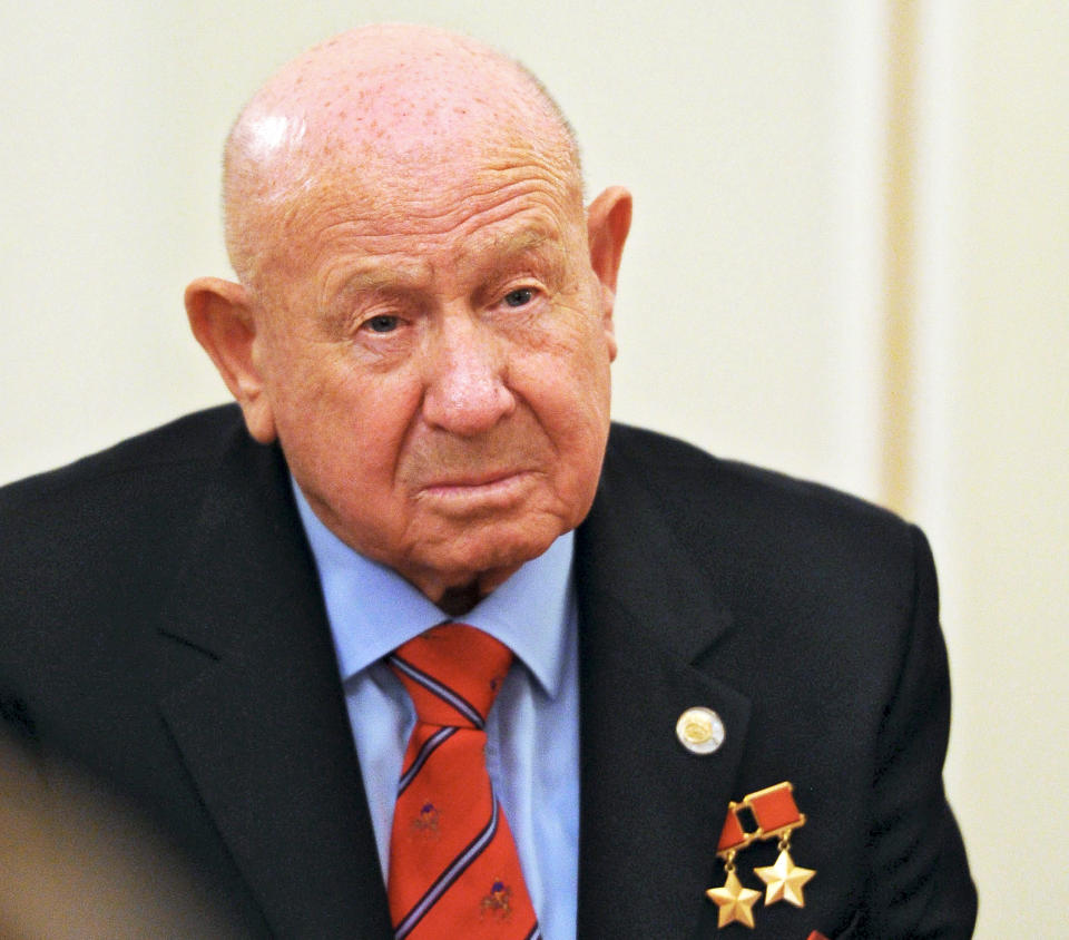 FILE - In this Friday, June 14, 2013 file photo, Russian cosmonaut Alexei Leonov, who made the first spacewalk in 1965, attends a meeting with Russian President Vladimir Putin in the Novo-Ogaryovo residence outside Moscow, Russia. Alexei Leonov, the first human to walk in space, died in Moscow on Friday, Oct. 11, 2019. He was 85 (Mikhail Klimentyev, Sputnik, Kremlin Pool Photo via AP, File)